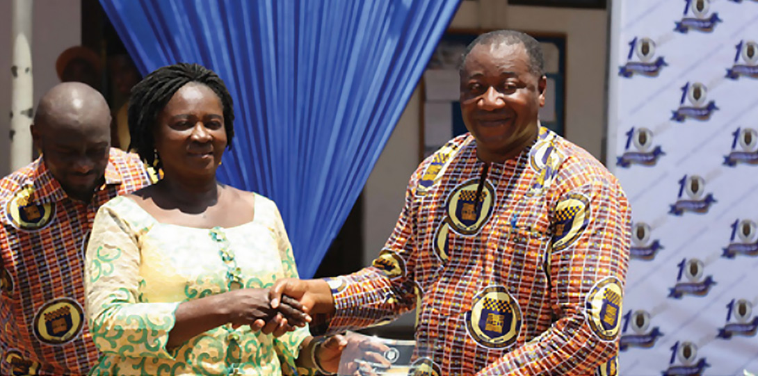 Dr. Darkwa receiving a long-term service award from Ghana’s Minister of Education.